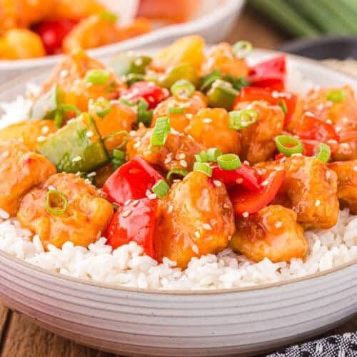 702. Pork Fried Rice, Sweet & Sour Boneless Pork and Almond Chicken
